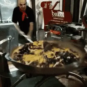 Chef Prepares Large Seafood Pasta Dish