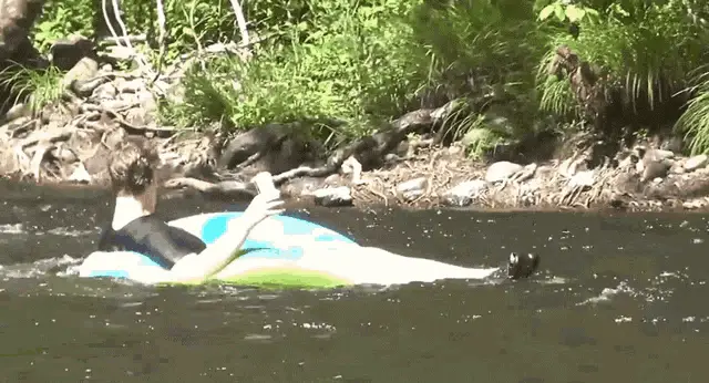 Jay Karl Chilling and Floating in the River