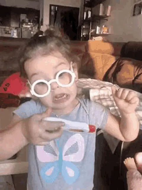 Little Girl Checks Temperature