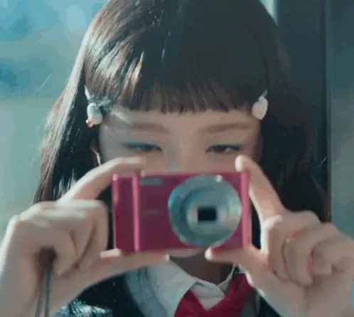 IVE Rei in Rebel Heart MV with Pink Camera