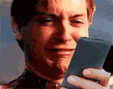 Tobey Maguire Spider-Man Crying with Phone Meme
