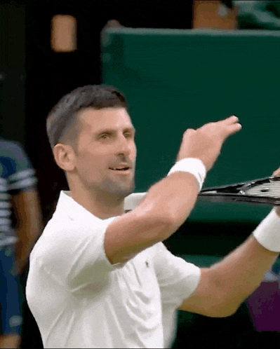Novak Djokovic Plays Tiny Violin