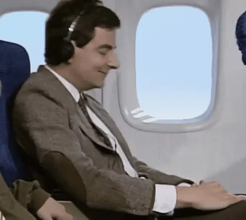 Mr. Bean Smiling on a Plane Meme – free memes GIF download | meme platform