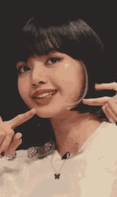 Vitoria Smiling and Pointing Cheeks