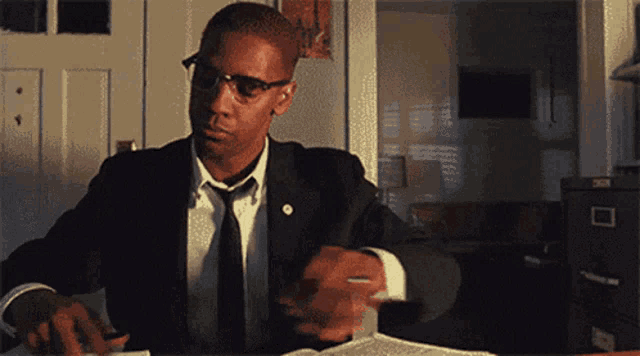 Frankt: Man in Suit Makes Thoughtful Gesture
