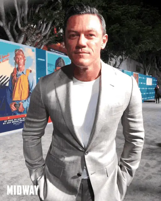 Luke Evans Tongue Out at Midway Premiere
