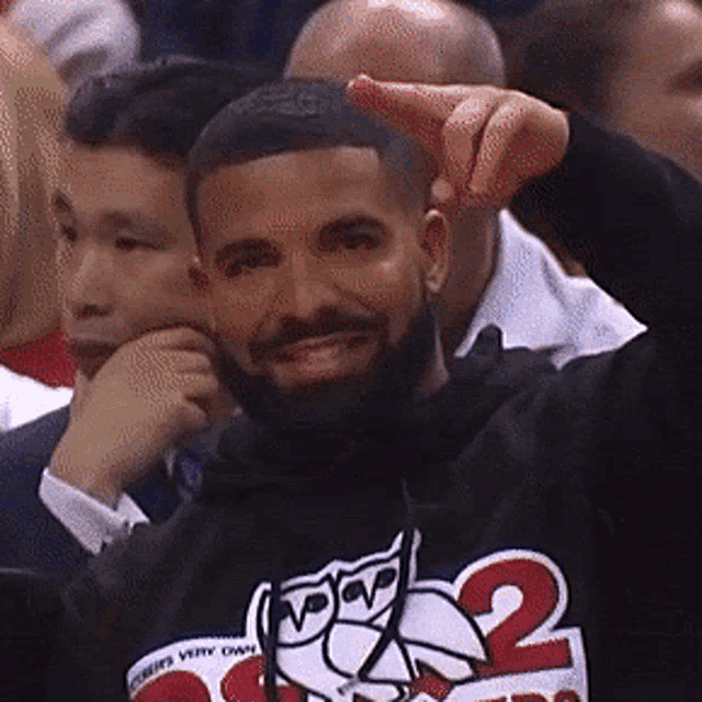 Ariultra Drake Smiling and Pointing