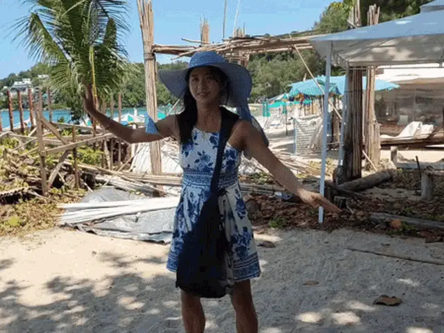 Jinnytty Dancing on the Beach in Thailand