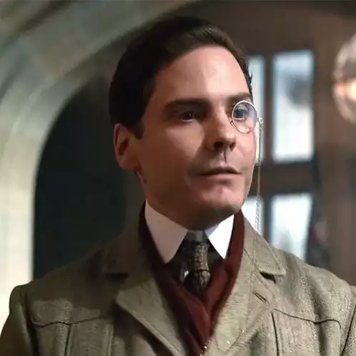Daniel Brühl with Monocle in Suit