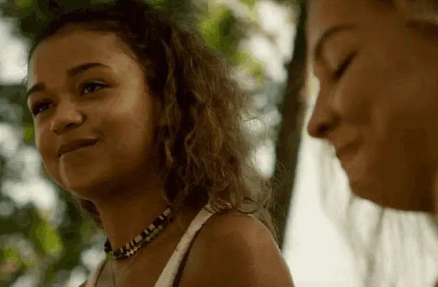 Kiara Carrera Shrug Smile - Outer Banks – free memes GIF download | meme platform