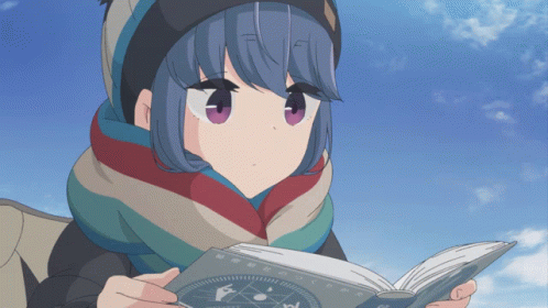 Rin Shima from the anime 'Yuru Camp' reading a book