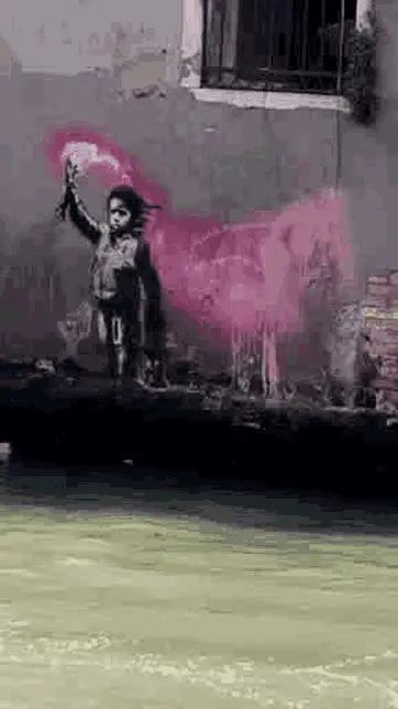 Banksy's Child with Pink Flare Graffiti in Venezia