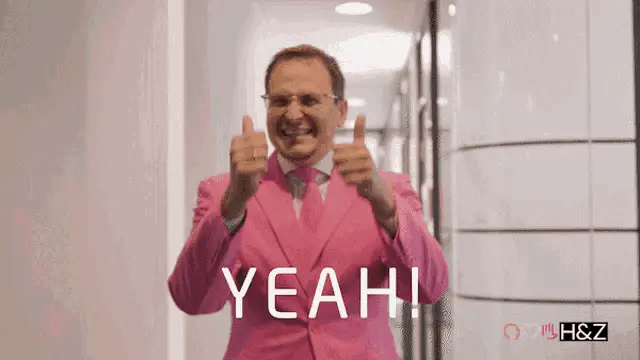 Man in Pink Suit Gives Thumbs Up - YEAH! – free GIF download