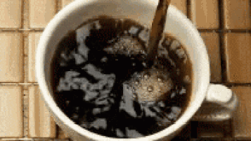 Pouring Fresh Coffee into a Mug