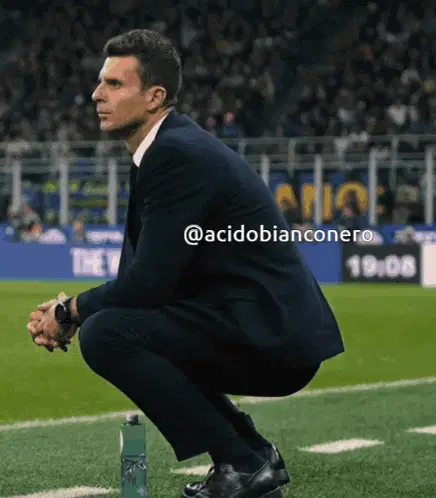 Thiago Motta Squatting on the Sidelines