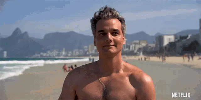 Smiling Wagner Moura on the Beach