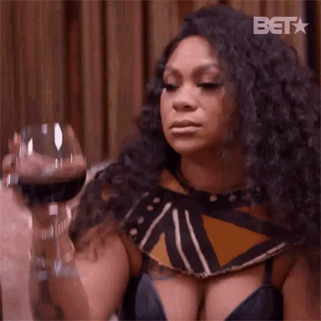Woman Raises a Glass - Lets Drink Nivea