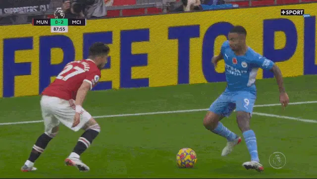 Telles Tackles Gabriel Jesus in Football Match