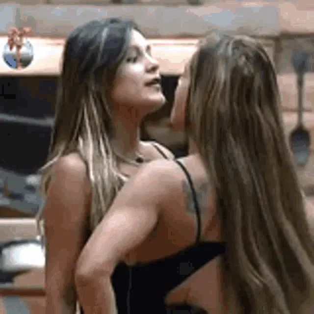 Denise Rocha and Andressa Urach's Passionate Kiss