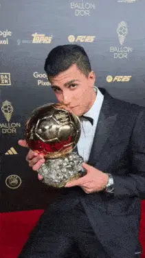 Rodri Rodrigo with Ballon d'Or Trophy