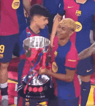 Lamine Yamal Lifts the Trophy in Celebration