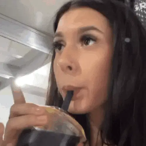 Ana Boiadeira drinking a beverage