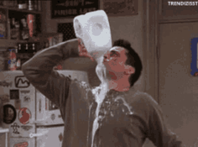 Man Spills Milk While Drinking