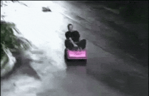 Man Crashes Pink Toy Car Down Hill