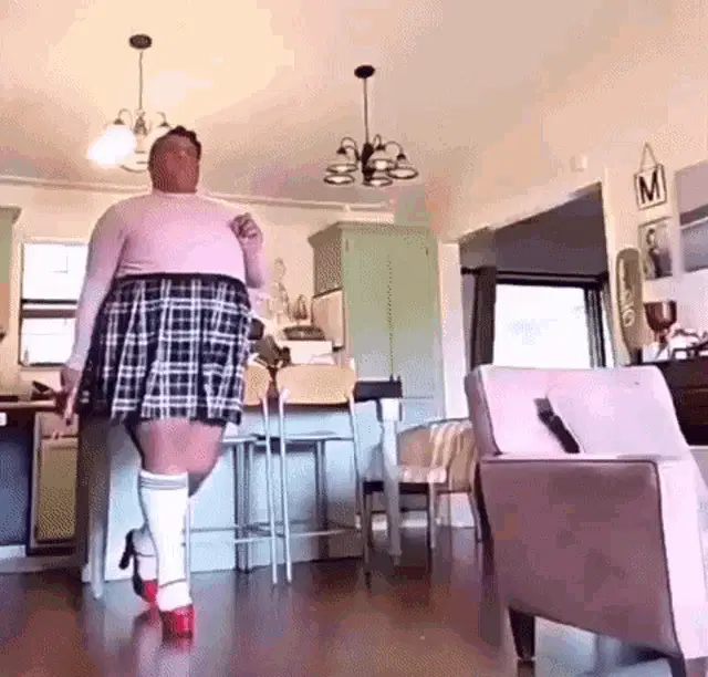 Oxytoxlc Oxytoxic walks in plaid skirt