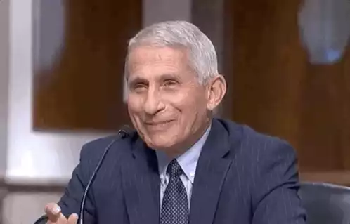 Man in Suit Laughing and Smiling