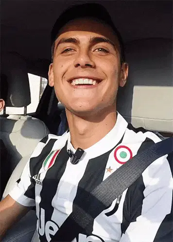 Paulo Dybala Smiling in Juventus Jersey with Vicky