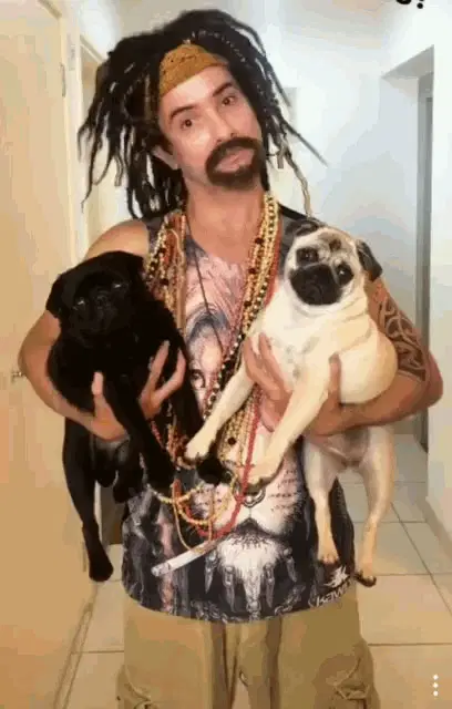 Serumaninho Marco Luque with his Pugs