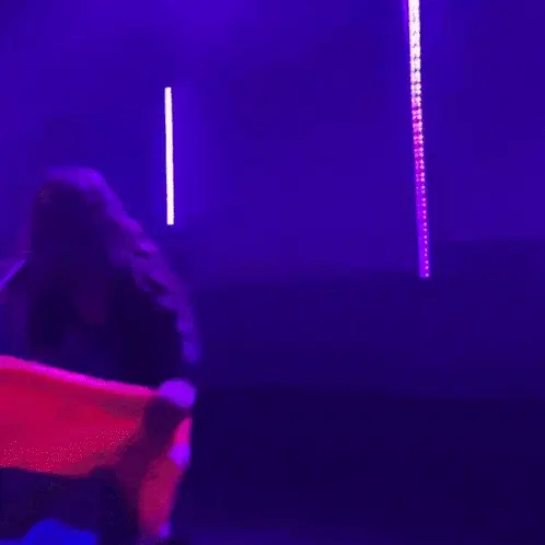 Isabel Larosa Dancing with Bi Pride Flag