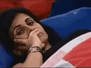 Gjirlfriend Lying Thoughtfully in Bed