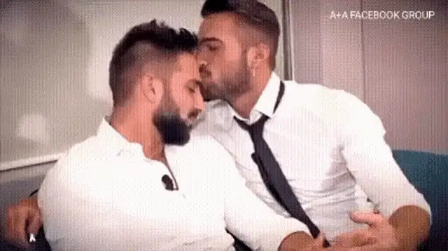 Alexandro Topini and Man Kissing