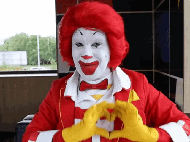 Ronald McDonald Makes a Heart Shape
