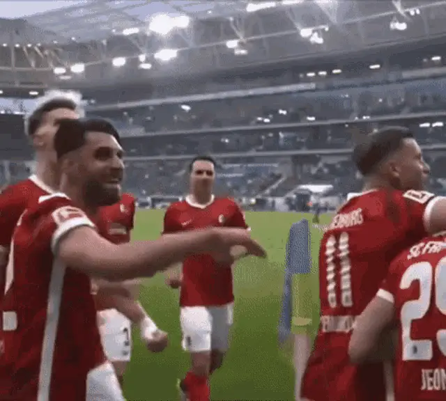 Nico Schlotterbeck celebrates with Freiburg team