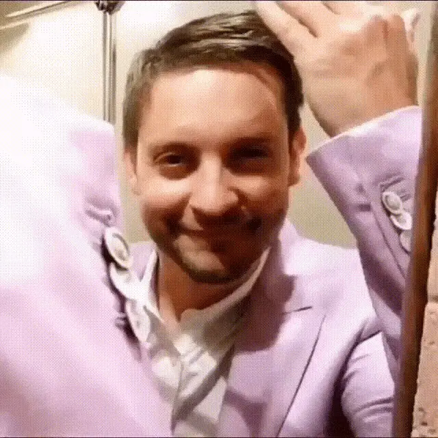 Tobey Maguire's Playful Peek