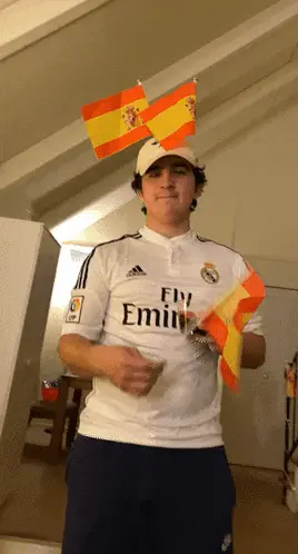 Man in Real Madrid Jersey with Spanish Flags