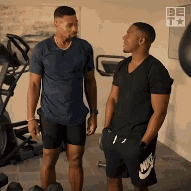 Karon Riley and Malcom Britton Hug in Gym