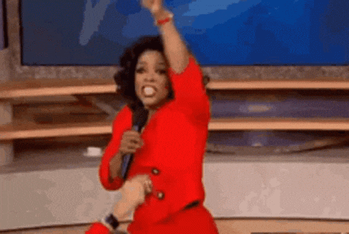 Oprah's Iconic Point and Fist Pump