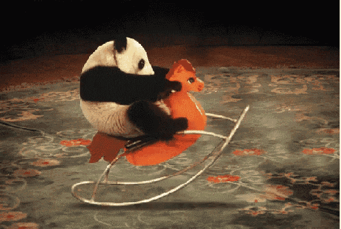 Panda Riding Rocking Horse
