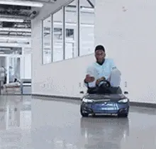 Happy Birthday Man in Toy Tesla