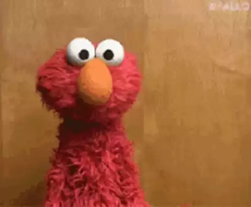 Elmo from Sesame Street Makes a Funny Face