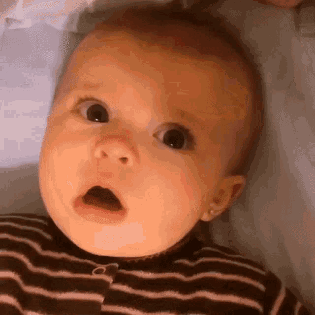 Baby's Surprised Look to Crying