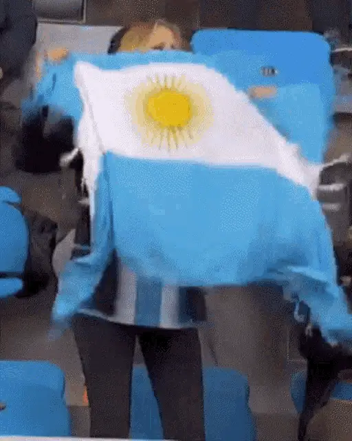 Woman Waving Argentina Flag at Event – free GIF download | meme platform | memes GIF