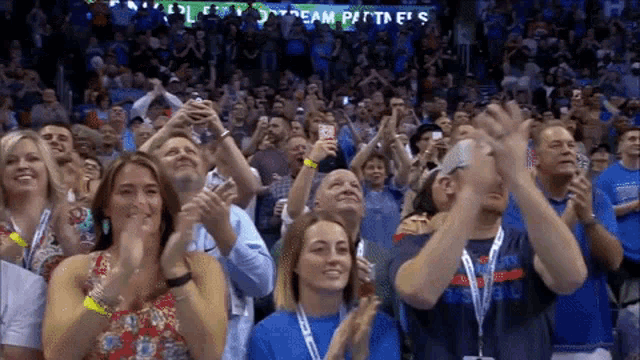 Crowd Cheering & Clapping for Team Partners