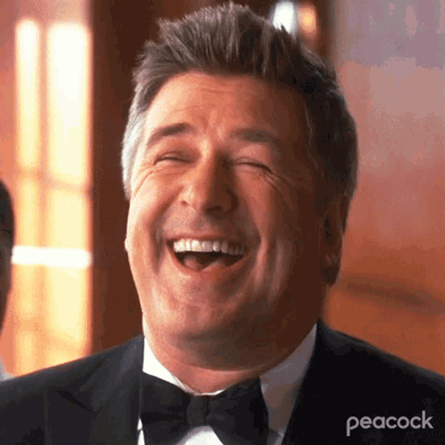 Alec Baldwin as Jack Donaghy Laughing