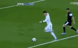 Mesut Özil Dribbling in Soccer Match