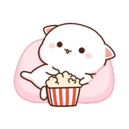 Happy Kitti Enjoys Popcorn Snack